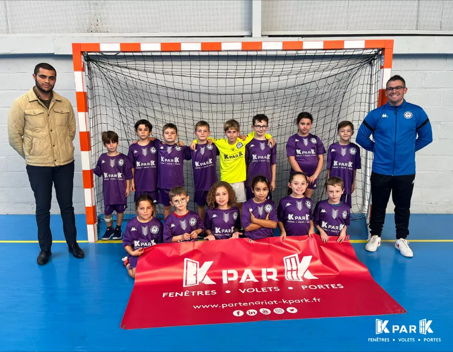 Remise officielle Amicale Laique Deville Handball photo d'équipe avec bâche